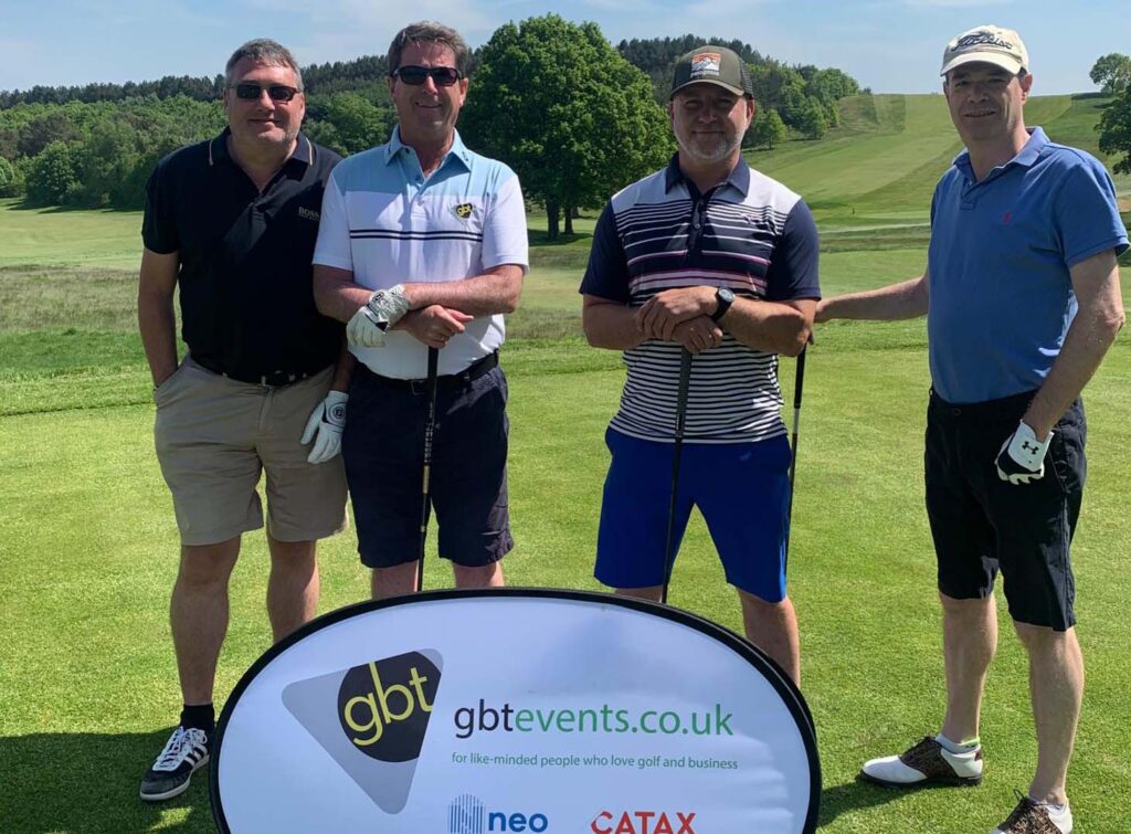 Four Golfers on the golf networking tour standing together for a picture